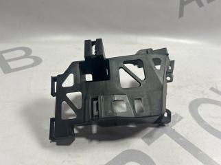 Запчасть кронштейн под фару правый Mazda 3 2007-2009