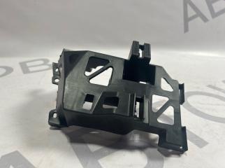 Запчасть кронштейн под фару левый Mazda 3 2007-2009
