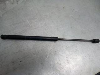 Амортизатор багажника Opel Astra H 2004-2015