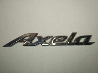 Эмблема багажника Mazda Axela