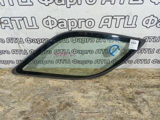 Стекло собачника левое Subaru Impreza