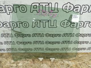 Стекло боковое заднее левое Nissan Bluebird