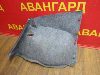 Обшивка багажника правая Opel Astra 1995