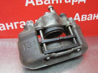 Суппорт тормозной передний левый Mazda Demio 2001