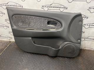 Фото запчасти обшивка двери передней левой передняя левая Kia Spectra 2009 Б/У запчасть Запчасть обшивка двери передней левой передняя левая Kia Spectra 2009