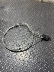 Фото запчасти трос корректора фар Renault Logan 2010 Б/У запчасть Запчасть трос корректора фар Renault Logan 2010