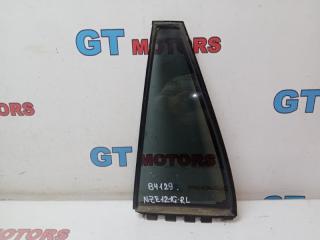 Стекло боковое заднее левое Toyota Corolla Fielder 2004