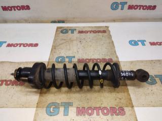 Стойка подвески задняя левая Mitsubishi Lancer Cedia 2002