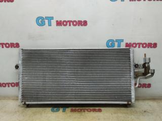 Радиатор кондиционера Mitsubishi Lancer 1999