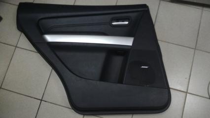 Обшивка двери задней левой (дверная карта) Mazda CX-9 2009 Б/У Обшивка двери задней левой (дверная карта) Mazda CX-9 2009