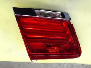 Фонарь в крышку багажника задний левый BMW 7