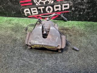 Суппорт тормозной передний правый SUBARU TRAVIQ 2001