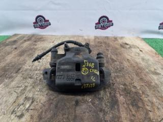 Суппорт тормозной передний левый TOYOTA ESTIMA EMINA 1997