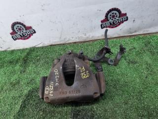 Суппорт тормозной передний левый SUBARU TRAVIQ 2005