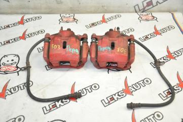 Суппорта передние (парой) передняя Nissan Stagea `1999