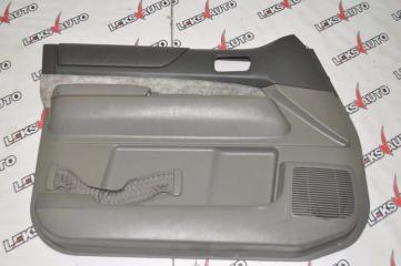 Обшивка двери передняя левая Nissan Safari 1999