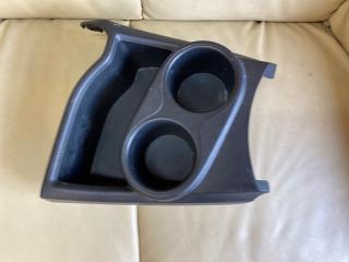 Фото запчасти подстаканник Toyota Aqua 2013 контрактная запчасть Запчасть подстаканник Toyota Aqua 2013