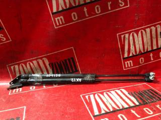 Амортизатор багажника задний NISSAN MARCH 2002-2010