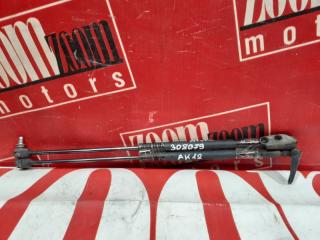 Амортизатор багажника задний NISSAN MARCH 2002-2010