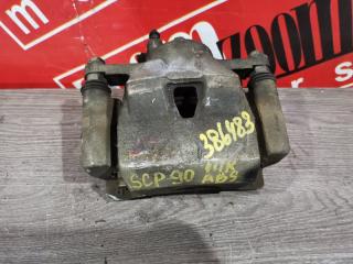 Суппорт передний правый TOYOTA VITZ 2005-2010