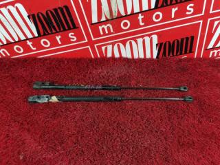 Амортизатор багажника задний NISSAN MARCH 2002-2010