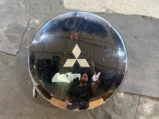 Запчасть Колпак запасного колеса  MITSUBISHI PAJERO IO MZ5476832 Контрактный Цвет: Черный   Царапины, потертости