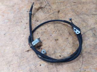 Трос ручника левый Nissan Bluebird 1996