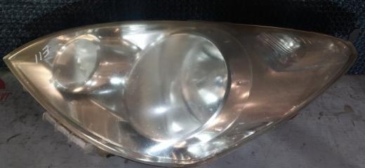 Фара левая Nissan Note 2009