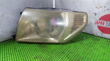 Фара левая Mitsubishi Pajero IO 1999