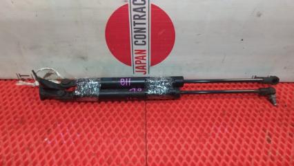 Амортизатор багажника Nissan Tiida 2004