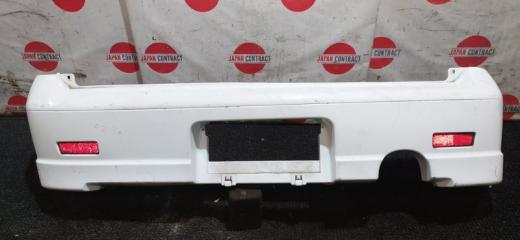 Бампер задний Nissan Cube 2000