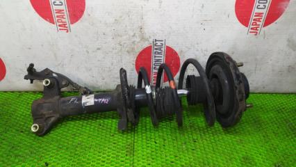 Стойка подвески передняя левая Nissan Primera 2001