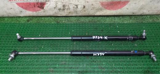 Амортизатор капота Nissan GLORIA 2001