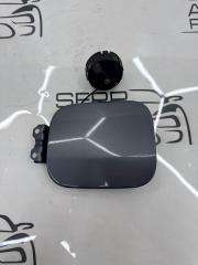 Фото запчасти лючок бензобака Mitsubishi Lancer 9 2005 контрактная запчасть Запчасть лючок бензобака Mitsubishi Lancer 9 2005