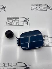 Фото запчасти лючок бензобака Mitsubishi Lancer 9 2007 контрактная запчасть Запчасть лючок бензобака Mitsubishi Lancer 9 2007