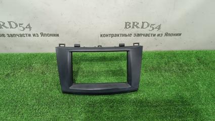 Запчасть рамка магнитофона Mazda Axela