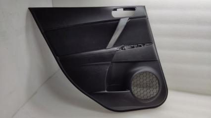 Запчасть обшивка двери задняя левая Mazda 3 2011
