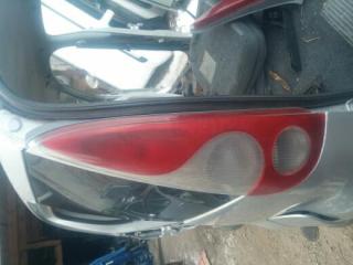 Запчасть фонарь задний левый задний левый TOYOTA FUNCARGO 1999