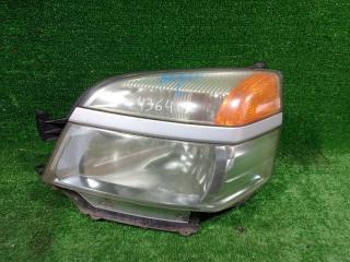 Фара левая TOYOTA VOXY 2004