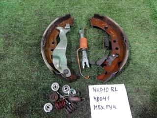 Запчасть механизм ручника с колодками левый TOYOTA AQUA 2012