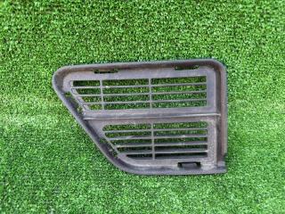 Запчасть заглушка бампера передняя DAIHATSU MIRA E:S