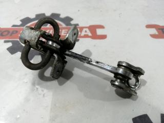 Запчасть ограничитель двери задний левый Subaru Traviq 2001
