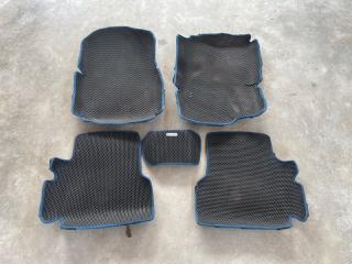 Фото запчасти коврики комплект Ford Focus 2006 Б/У запчасть Запчасть коврики комплект Ford Focus 2006