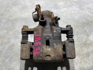 Запчасть суппорт тормозной задний левый Nissan BLUEBIRD 2000