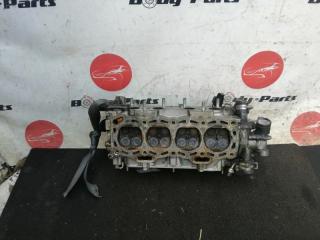 Головка блока цилиндров TOYOTA STARLET EP95 4E 1 2 ракурс