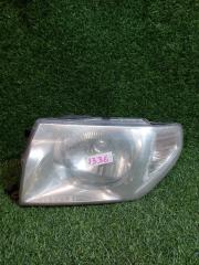 Фара левая передняя MITSUBISHI PAJERO IO H77W 100-87312 1 ракурс
