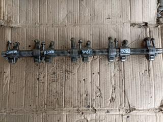 Ось коромысел левый Mitsubishi Canter 2000