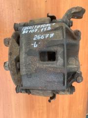 Суппорт тормозной левый Toyota ToyoAce 1999