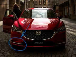 Запчасть заглушка бампера передняя правая MAZDA ATENZA