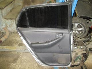 Обшивка двери задняя левая Toyota Corolla 2004